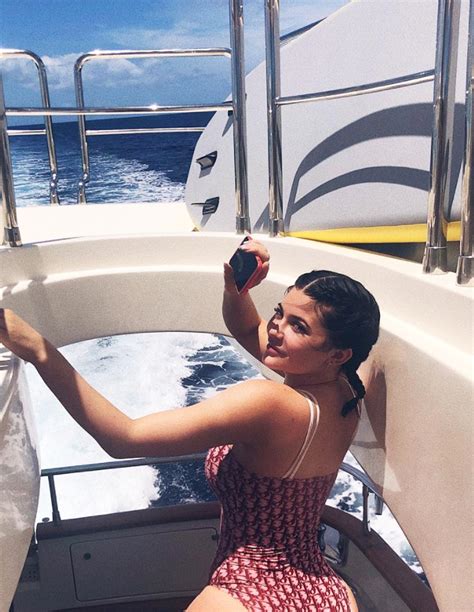 Kylie Jenner poses in Dior floral bikini for Instagram photos 